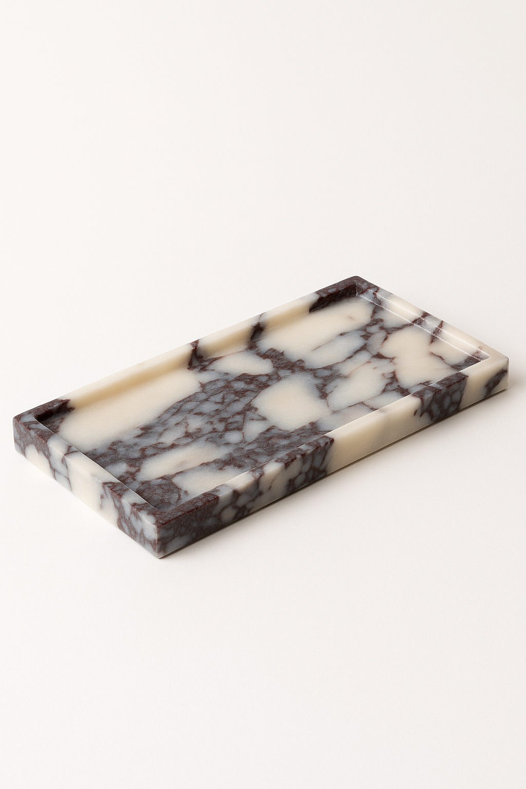Calcutta Viola rectangular marble tray with burgundy veining on white background