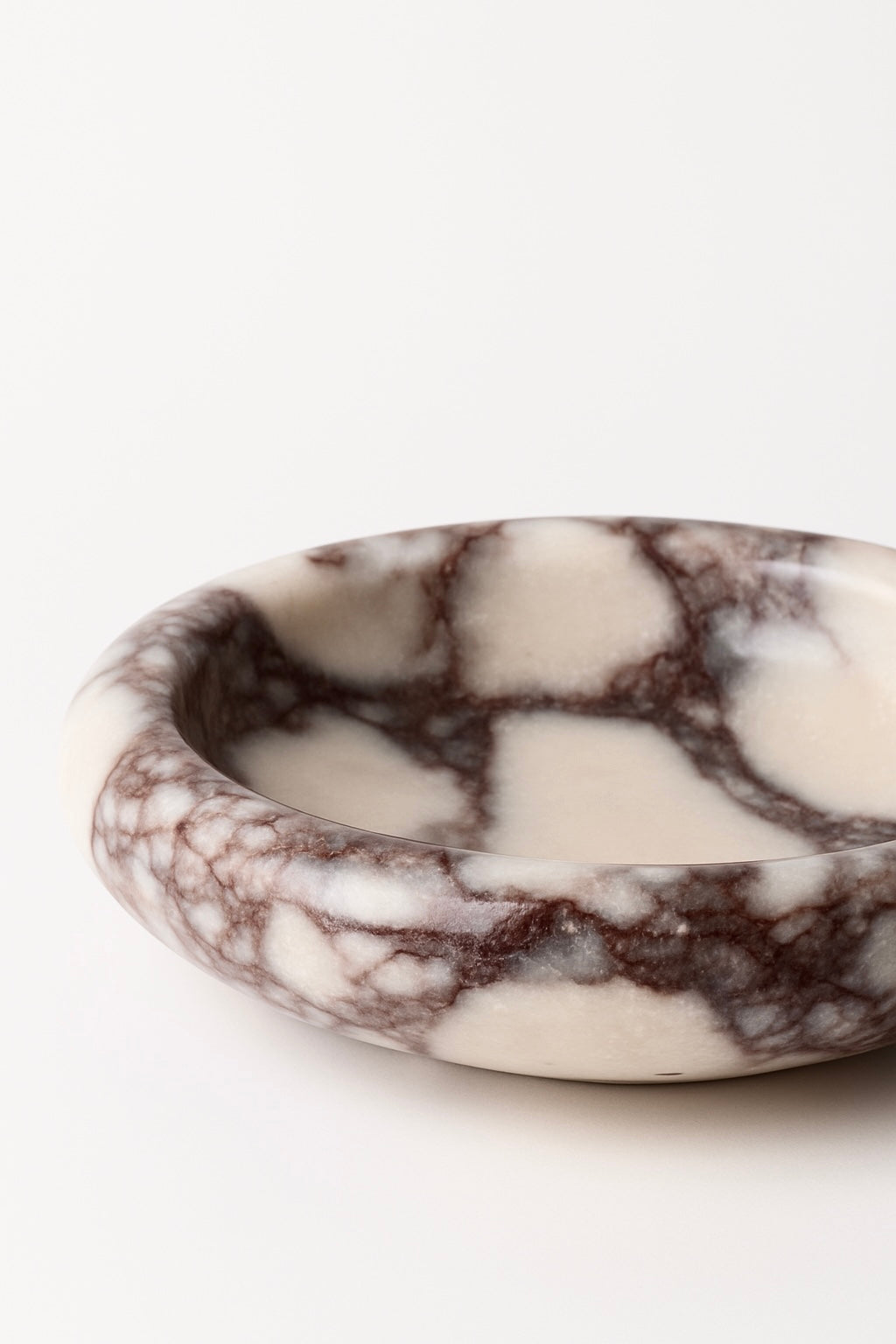 Marble-patterned bowl on a white background