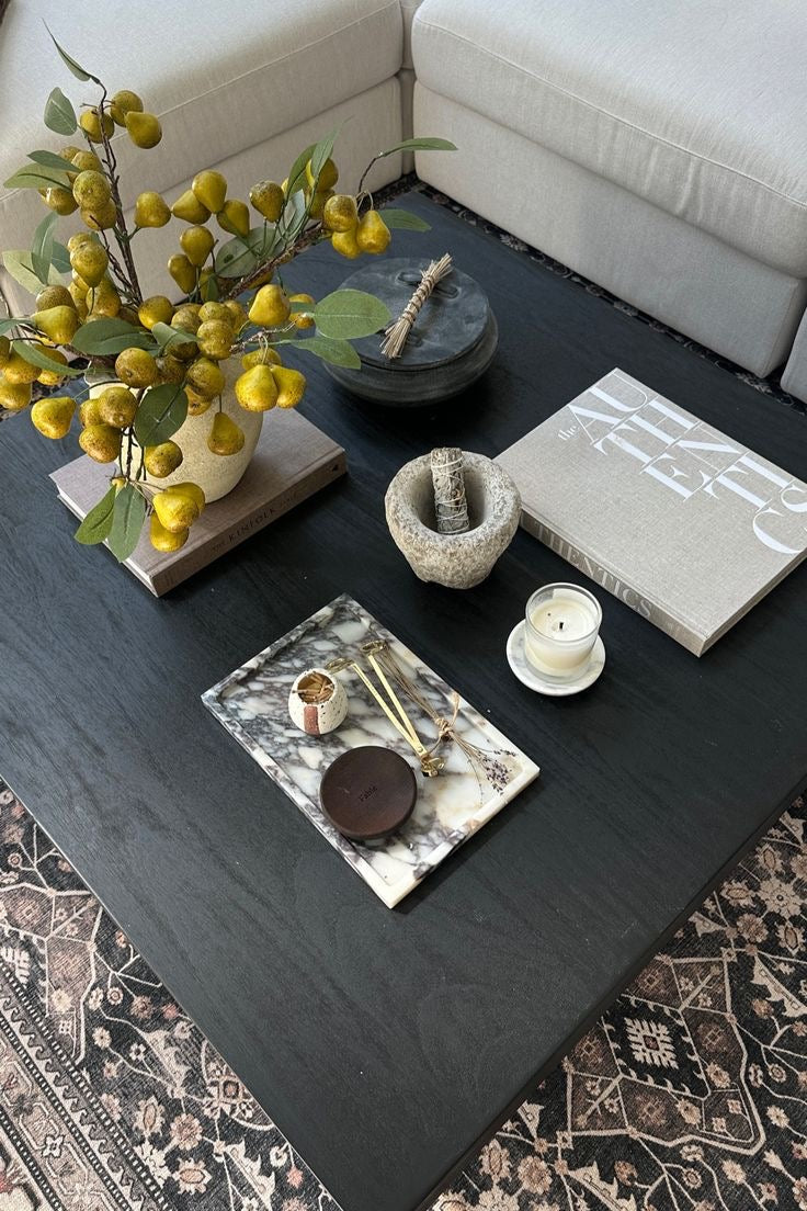 Calcutta Viola marble tray styled with luxury home accessories on dark slate surface - handcrafted Italian stone tray with burgundy veining displayed alongside brass candle, dried flowers, and modern decor pieces"
This alt text includes:
Your product name (Calcutta Viola marble tray)
Key materials (Italian stone, burgundy veining)
Styling context (luxury home accessories, dark slate surface)
Specific items shown (brass candle, dried flowers, modern decor)
SEO keywords (handcrafted, luxury, marble tray)
You 