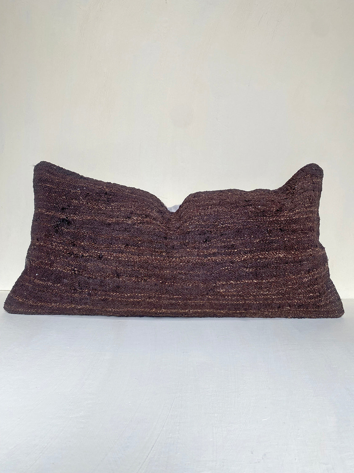 Handwoven vintage brown Turkish kilim cushion cover with rich earthy tones, made from Turkish wool – ideal for rustic living rooms and layered sofa styling.